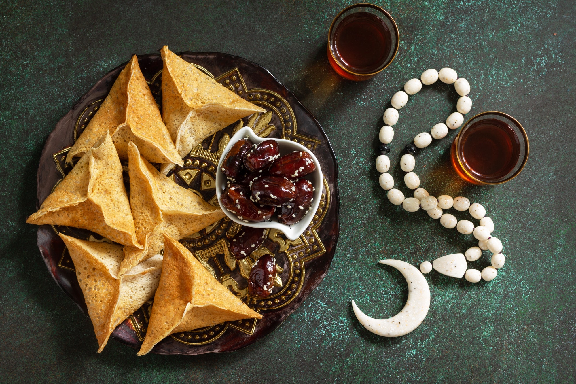 Ramadan kareem festive, fasting, halal food. Ramadan menu, arabian pancake katayef.